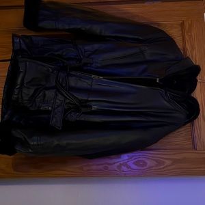 Woman’s leather coat in perfect condition. Fur lined.